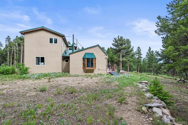 a front view of a house with balcony