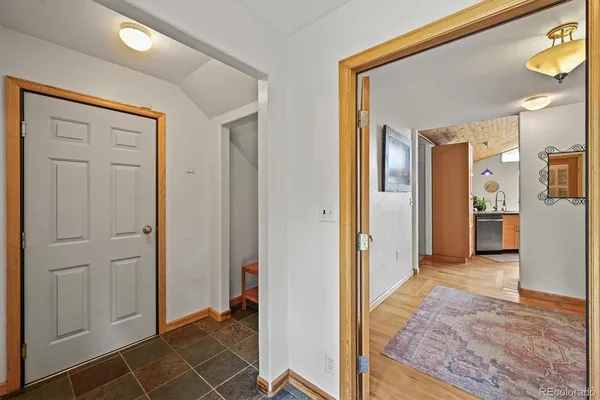 wooden floor with a bedroom
