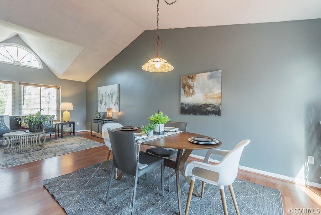 10148 Ridgerun Road Chesterfield, VA 23832 - Photo 12 of 48 a view of a dining room with furniture and wooden floor