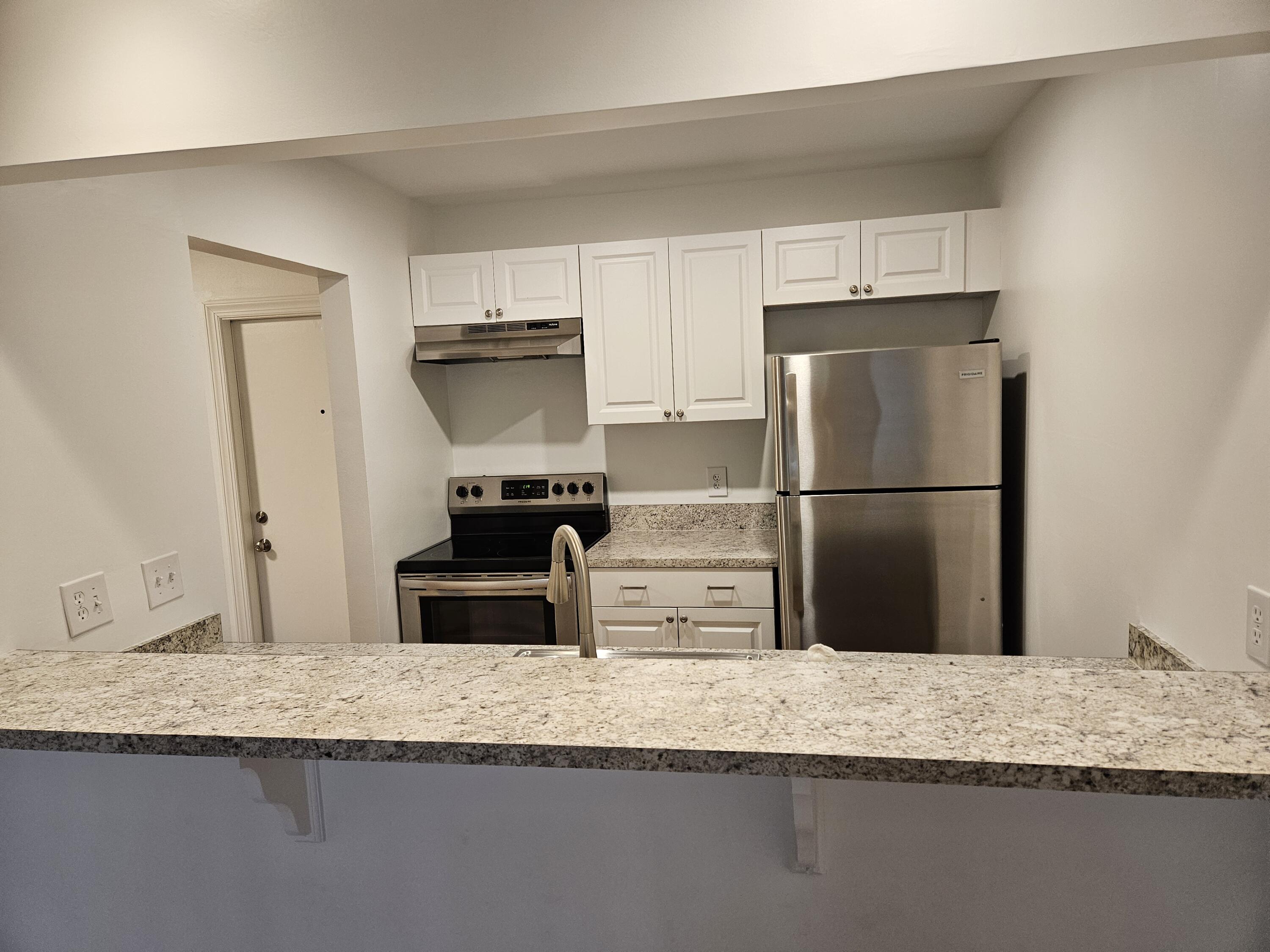 825 Northwest 13th Street, Unit 115 Boca Raton, FL 33486 - Photo 3 of 11 Updated Kitchen