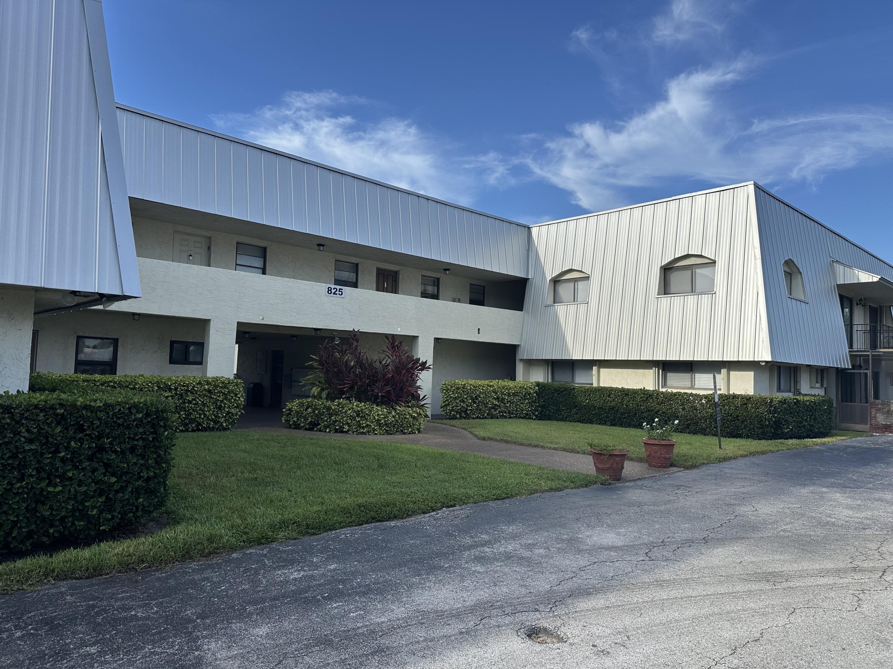 825 Northwest 13th Street, Unit 115 Boca Raton, FL 33486 - Photo 7 of 11 Exterior front