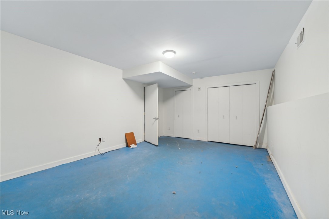12642 Mayfield Road Cleveland, OH 44106 - Photo 32 of 48 1st level multi-purpose room is accessed from the interior rear of the garage. It is finished space with many possibilities.