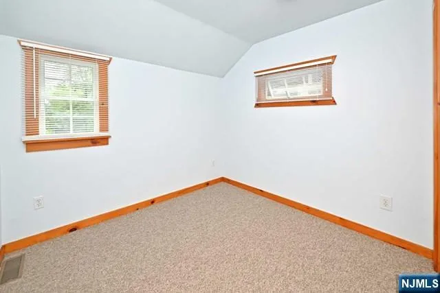 a view of a room with a window