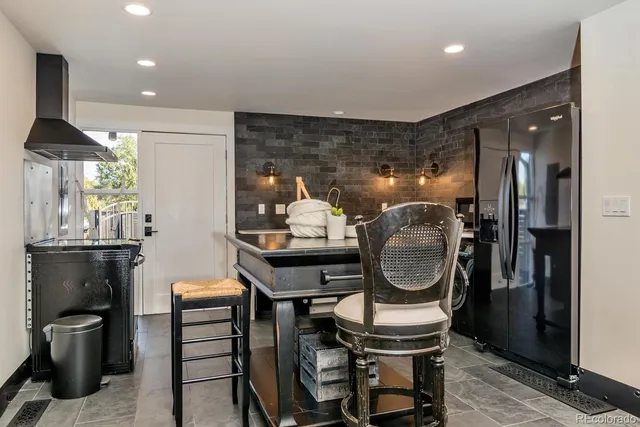 a bathroom with a toilet a sink and a mirror