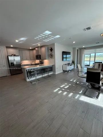 a view of a dining room with furniture