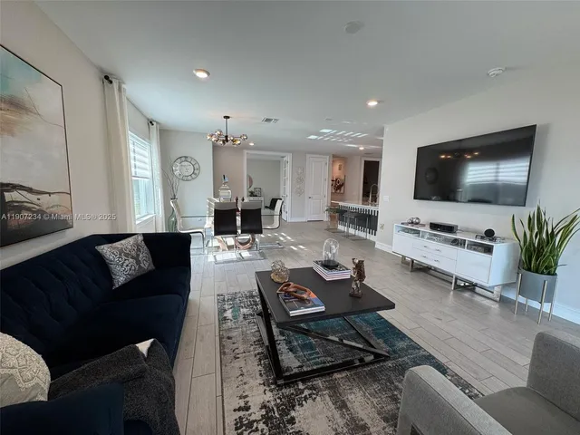a bathroom with a double vanity sink and mirror