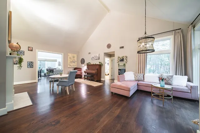 a view of a livingroom with furniture and wooden floor