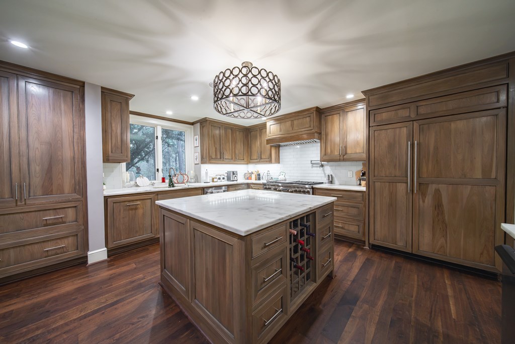 517 Double Churches Road Columbus, GA 31904 - Photo 19 of 96 a kitchen with a sink stove and cabinets