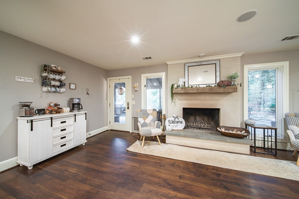 517 Double Churches Road Columbus, GA 31904 - Photo 24 of 96 a living room with furniture and a fireplace