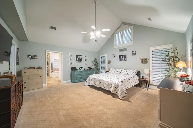a bath tub sitting in a bathroom next to a window