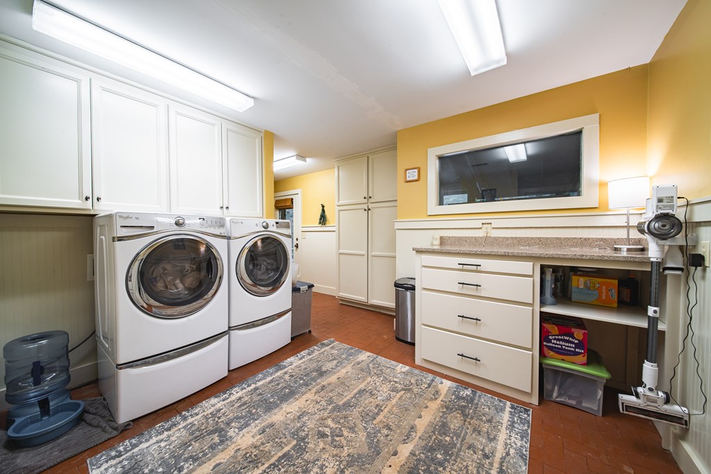 517 Double Churches Road Columbus, GA 31904 - Photo 45 of 96 a utility room with sink dryer and washer