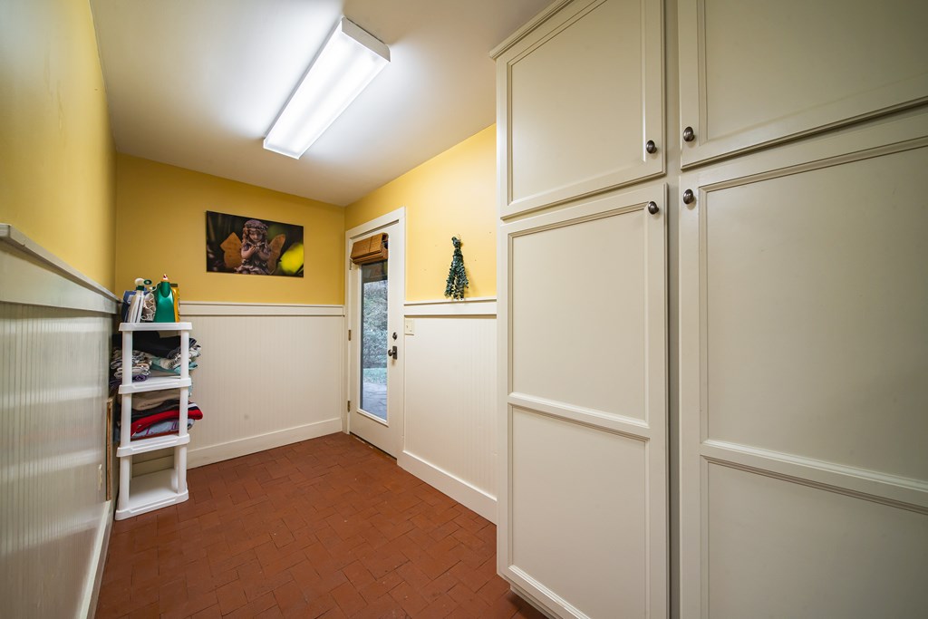 517 Double Churches Road Columbus, GA 31904 - Photo 46 of 96 a view of storage and utility room with refrigerator