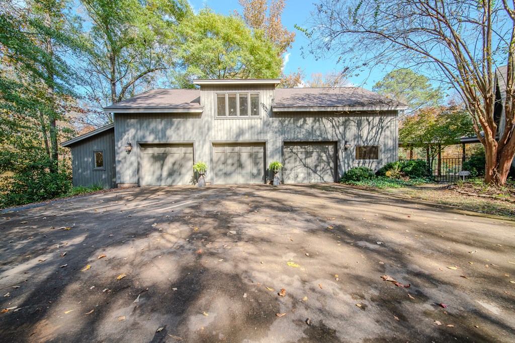 517 Double Churches Road Columbus, GA 31904 - Photo 8 of 96 a front view of a house with a garden