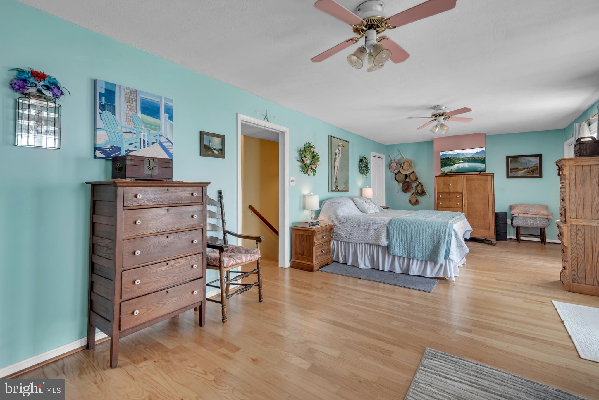 4249 Kings Road Edgewater, MD 21037 - Photo 26 of 54 a bedroom with furniture and a wooden floor