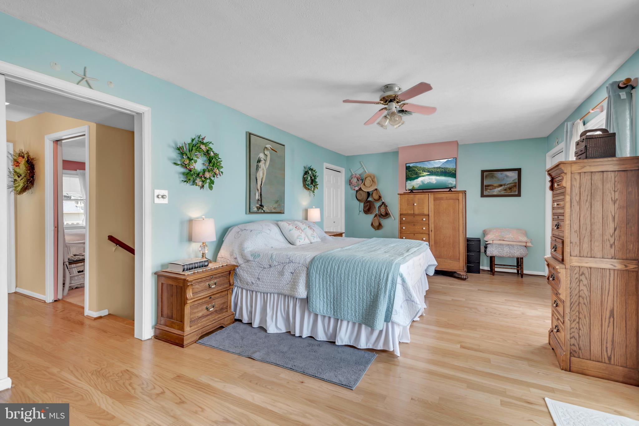 4249 Kings Road Edgewater, MD 21037 - Photo 27 of 54 a bedroom with a bed and a ceiling fan