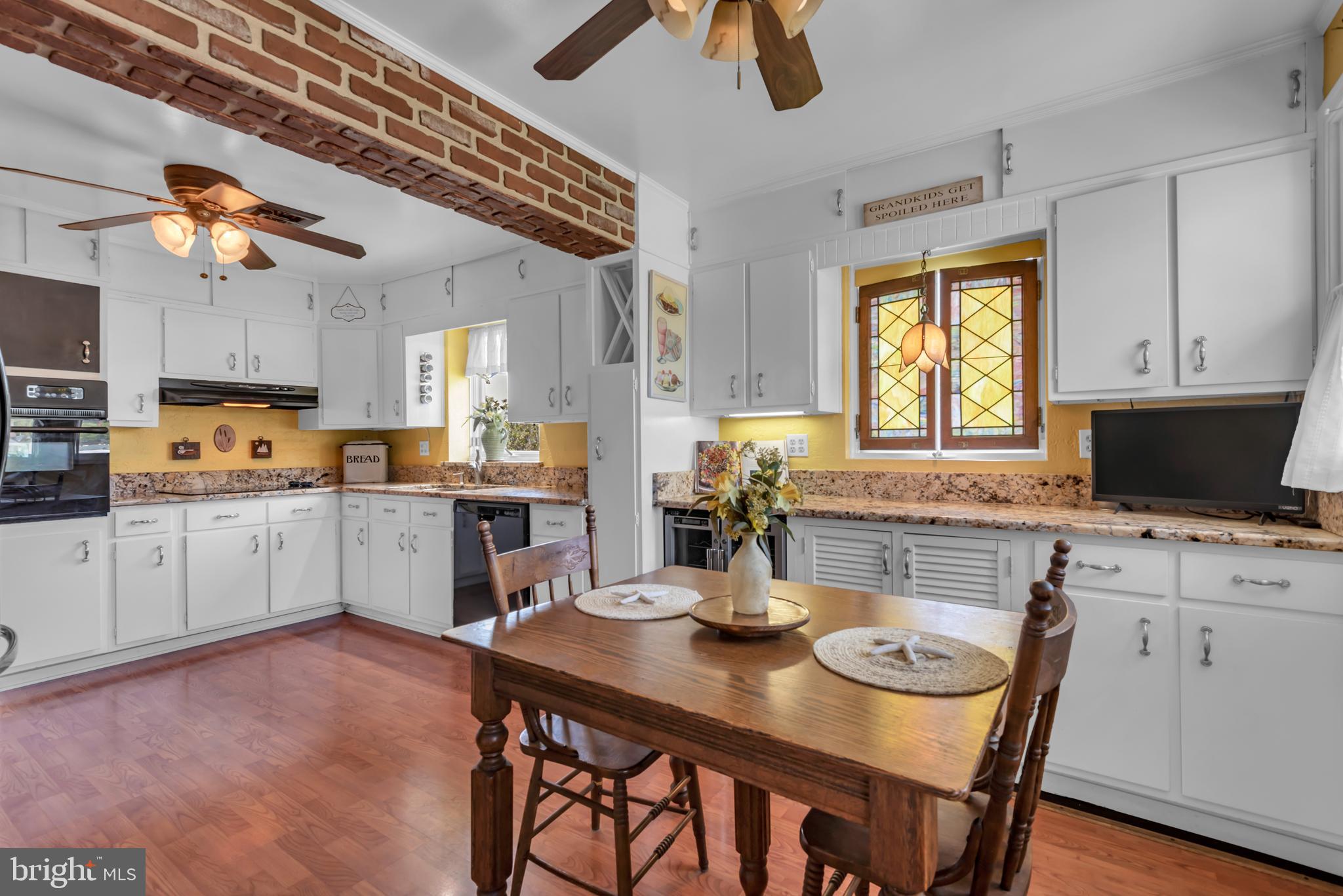 4249 Kings Road Edgewater, MD 21037 - Photo 8 of 54 a kitchen with furniture a window and appliances