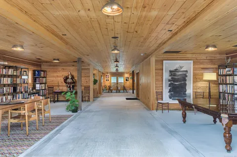 a view of a livingroom with furniture and window