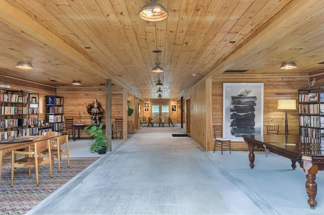 a view of a livingroom with furniture and window