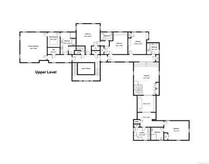 a picture of a bench in front of a wall