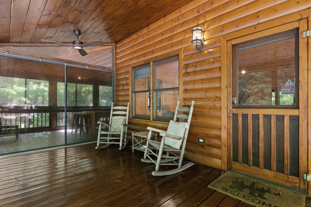 220 Solar Drive Blue Ridge, GA 30513 - Photo 5 of 59 a view of a balcony with chairs