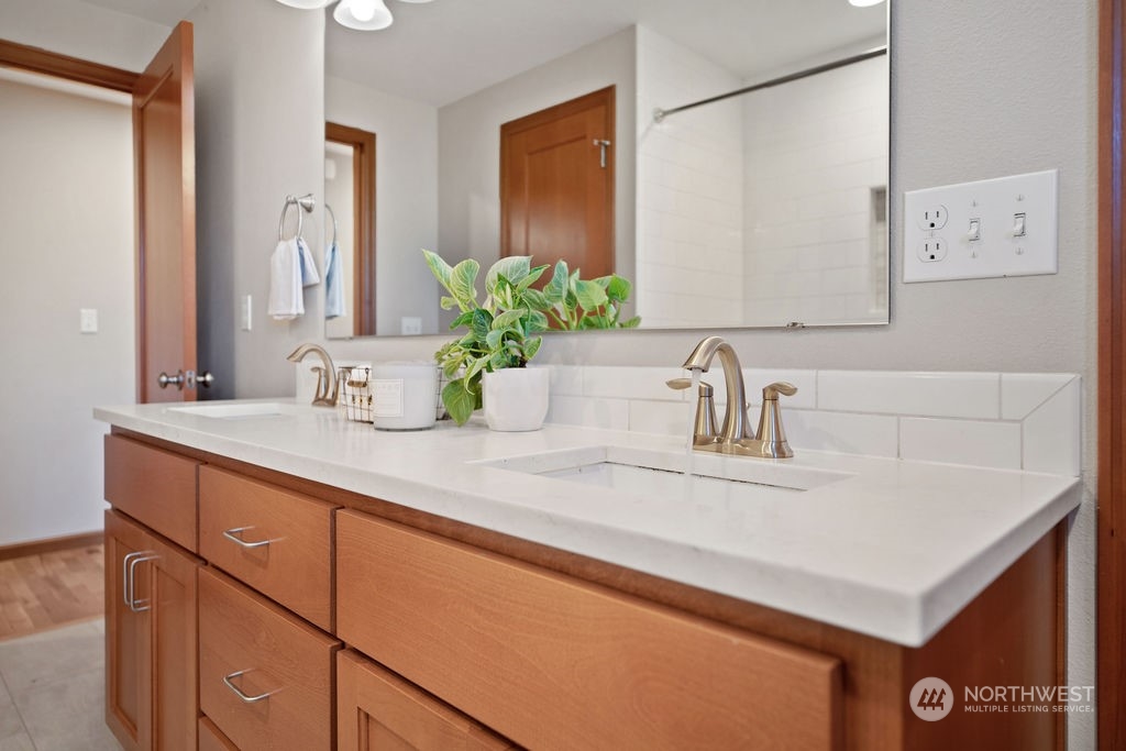 16303 Roosevelt Road Snohomish, WA 98290 - Photo 16 of 36 a bathroom with a sink and a mirror