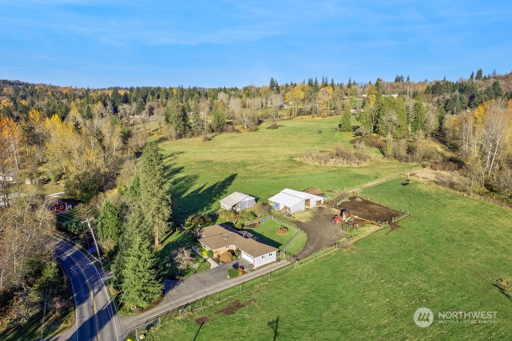 16303 Roosevelt Road Snohomish, WA 98290 - Photo 27 of 36 a view of a lake with a yard