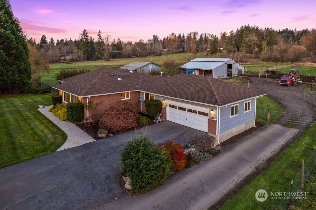 16303 Roosevelt Road Snohomish, WA 98290 - Photo 35 of 36 a view of a houses with a big yard