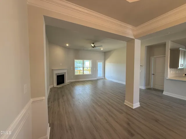 a view of livingroom with hardwood floor and fireplace