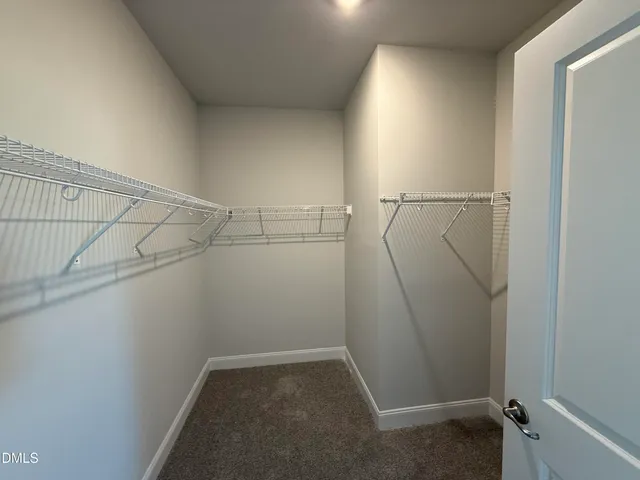 a view of a room with racks on the wall