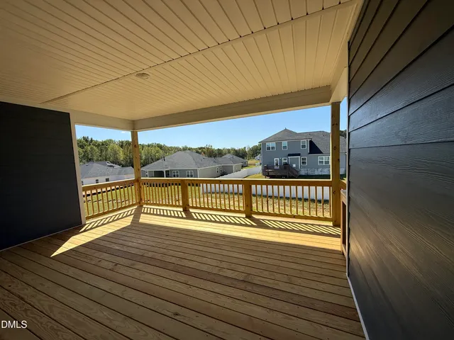 a view of a house with a barbeque