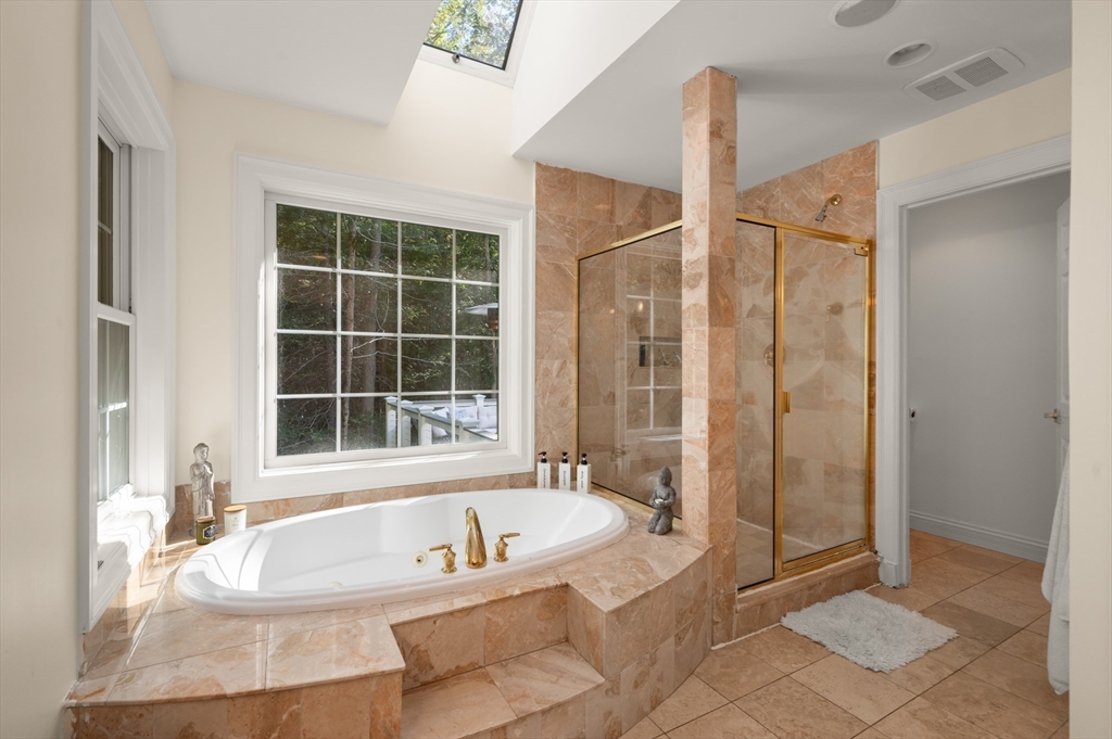 27 Turtle Back Road Essex, MA 01929 - Photo 22 of 40 a bath tub sitting next to a window