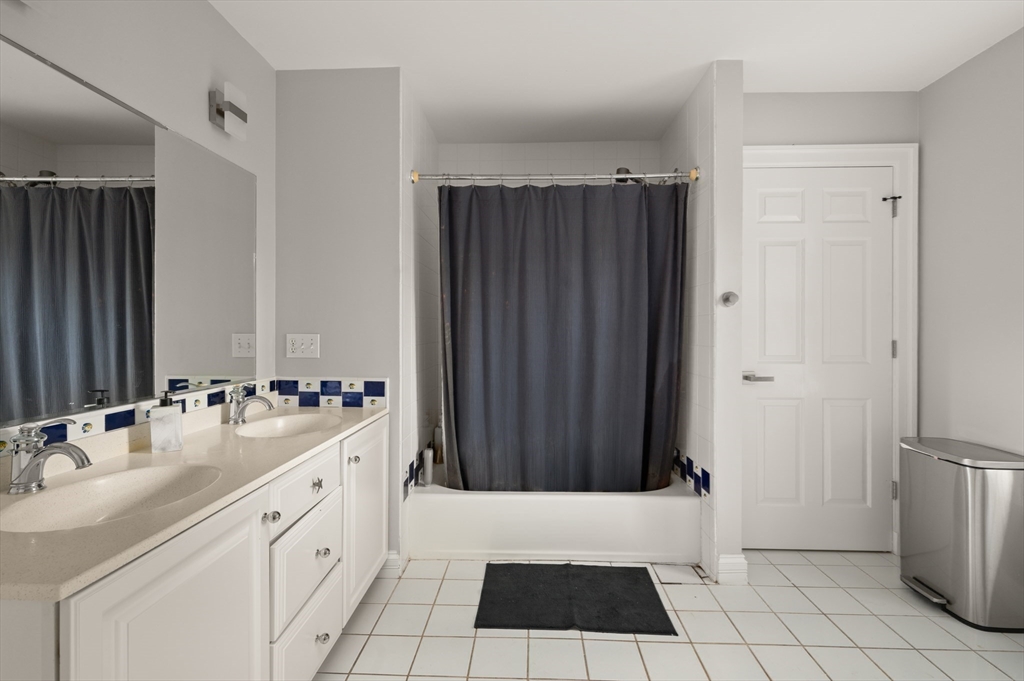27 Turtle Back Road Essex, MA 01929 - Photo 29 of 40 a bathroom with a sink and a mirror