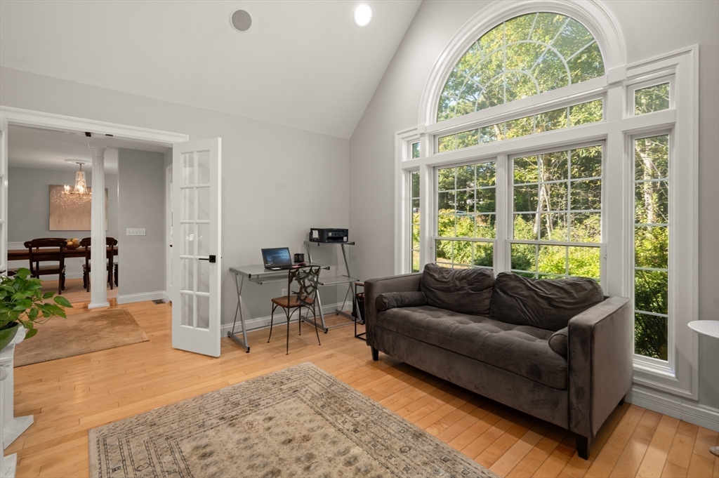 27 Turtle Back Road Essex, MA 01929 - Photo 33 of 40 a living room with furniture and a large window