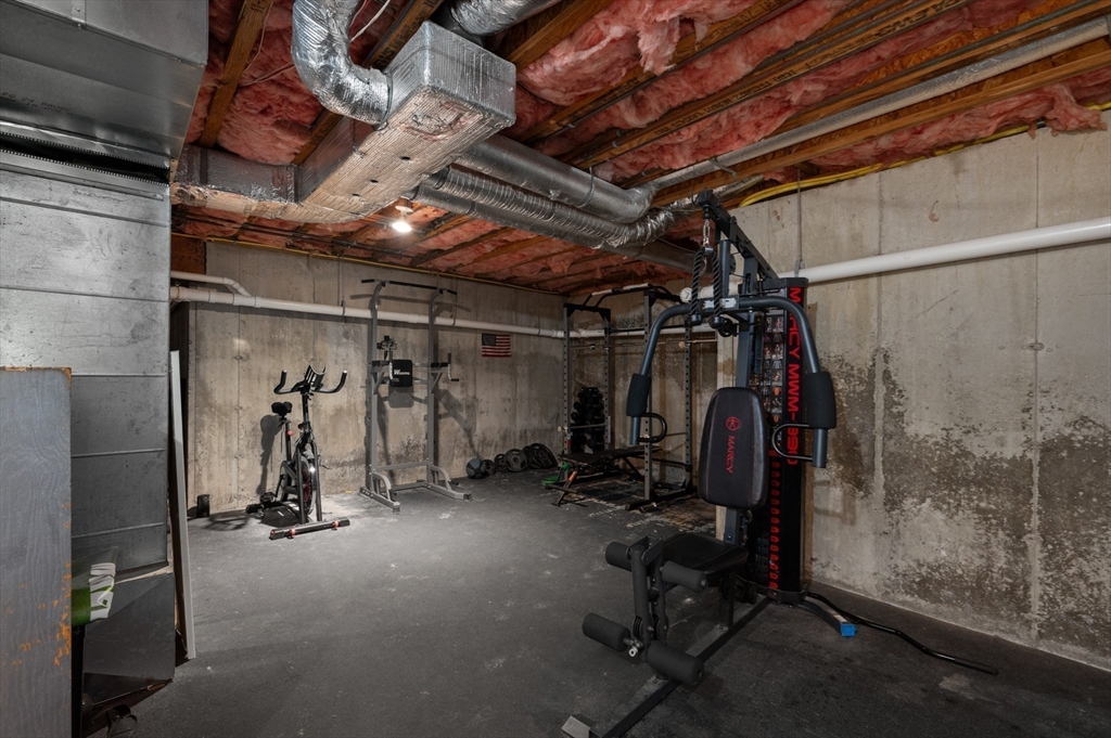 27 Turtle Back Road Essex, MA 01929 - Photo 40 of 40 a view of a room with gym equipment