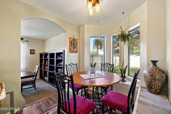a view of a dining room with furniture