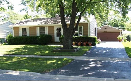 449 Glendale Road Buffalo Grove, IL 60089 - Photo 1 of 1 a front view of a house with a garden