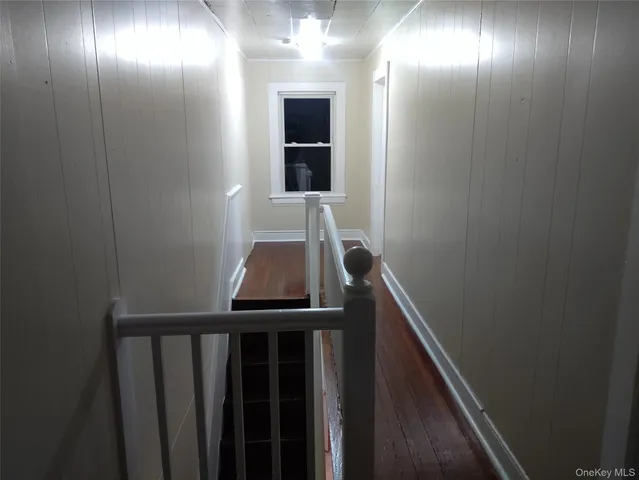 a view of a hallway with entryway