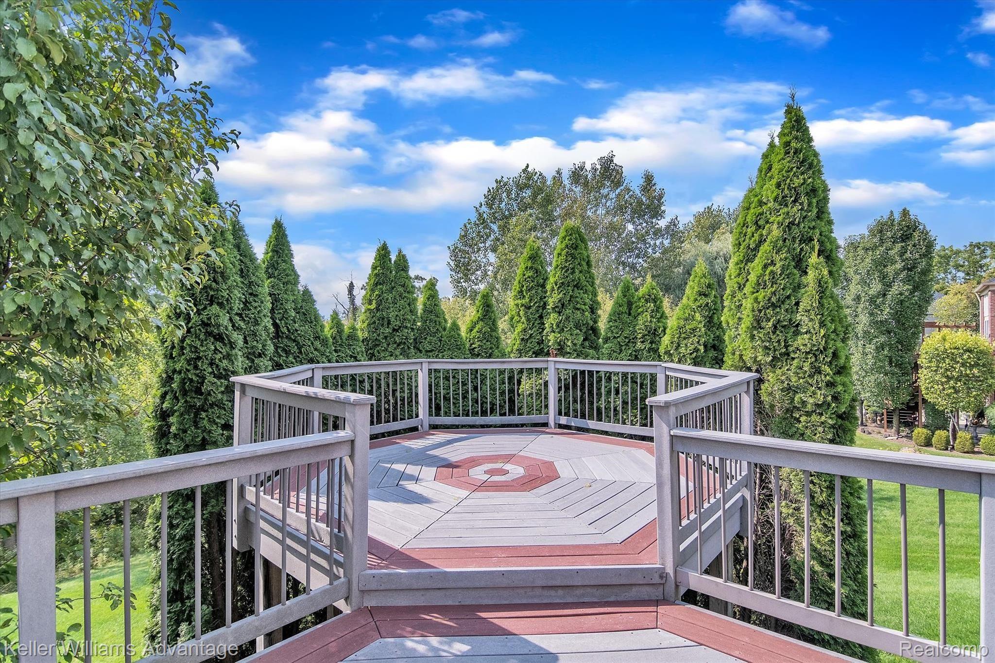 9042 Ridgefield Drive Brighton, MI 48114 - Photo 48 of 61 Privately set outdoor eating area