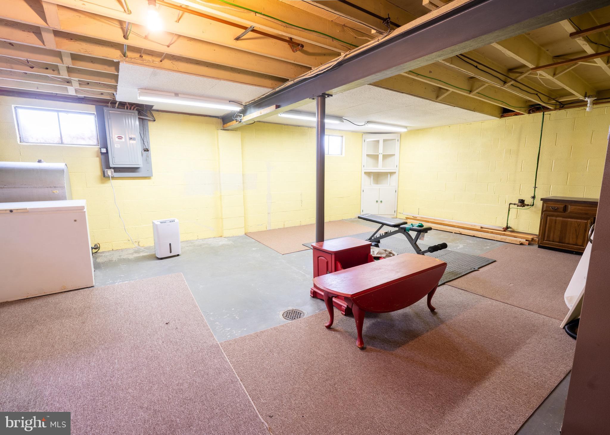 104 Rose Court Reading, PA 19607 - Photo 18 of 28 a living room with furniture and a table