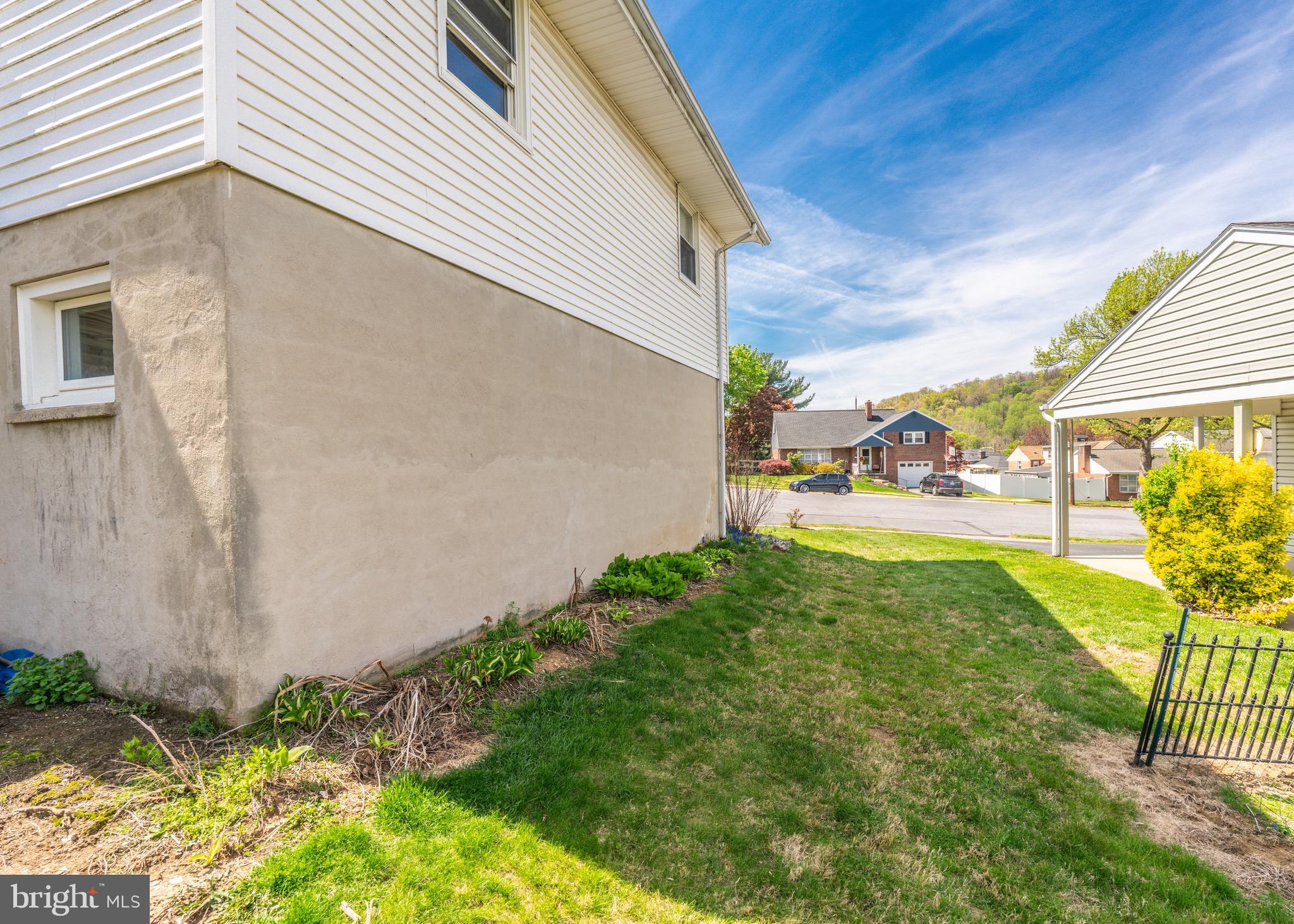 104 Rose Court Reading, PA 19607 - Photo 3 of 28 a view of yard along with trees