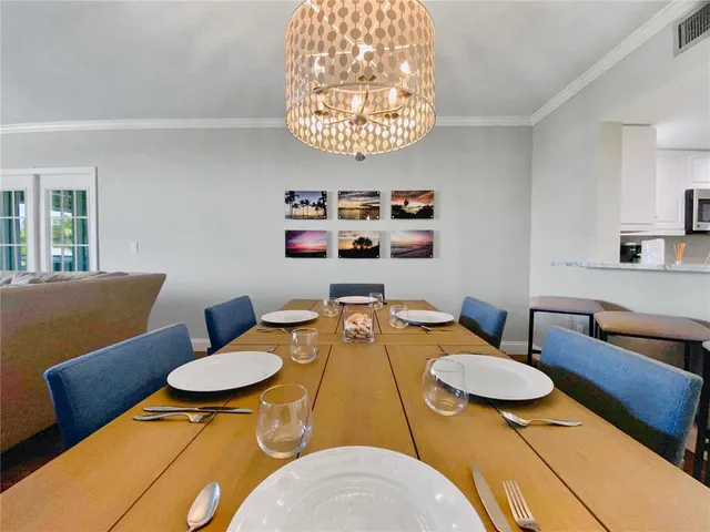 a outdoor space with furniture and a chandelier