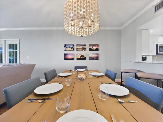 a view of a dining room with furniture