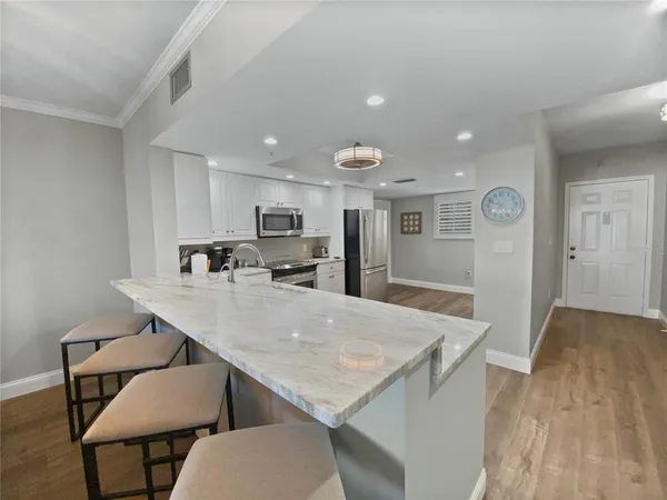 a view of kitchen and windows