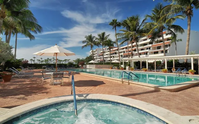 a view of a house with swimming pool