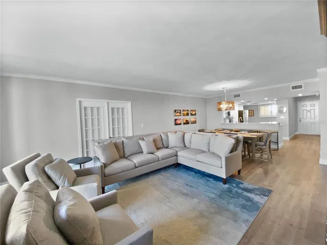 a living room with furniture and a table