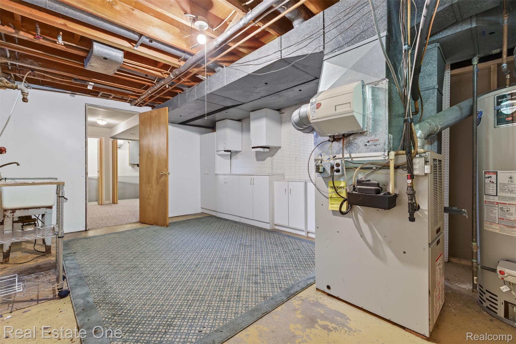 10379 Hegel Road Goodrich, MI 48438 - Photo 45 of 70 46) Lower Level Laundry Room.jpg