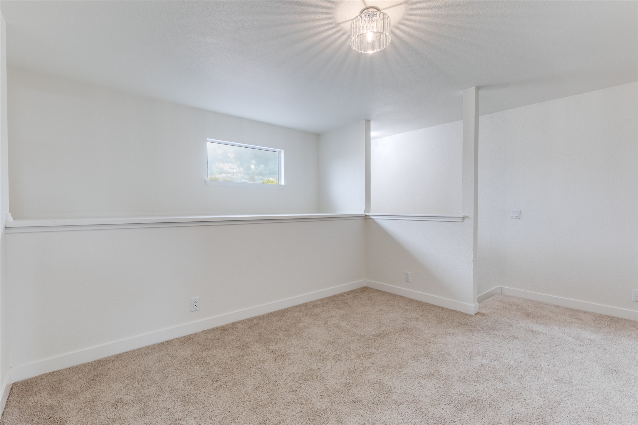 109 Orange Tree Lane Georgetown, TX 78626 - Photo 17 of 25 an empty room with a ceiling fan and a window
