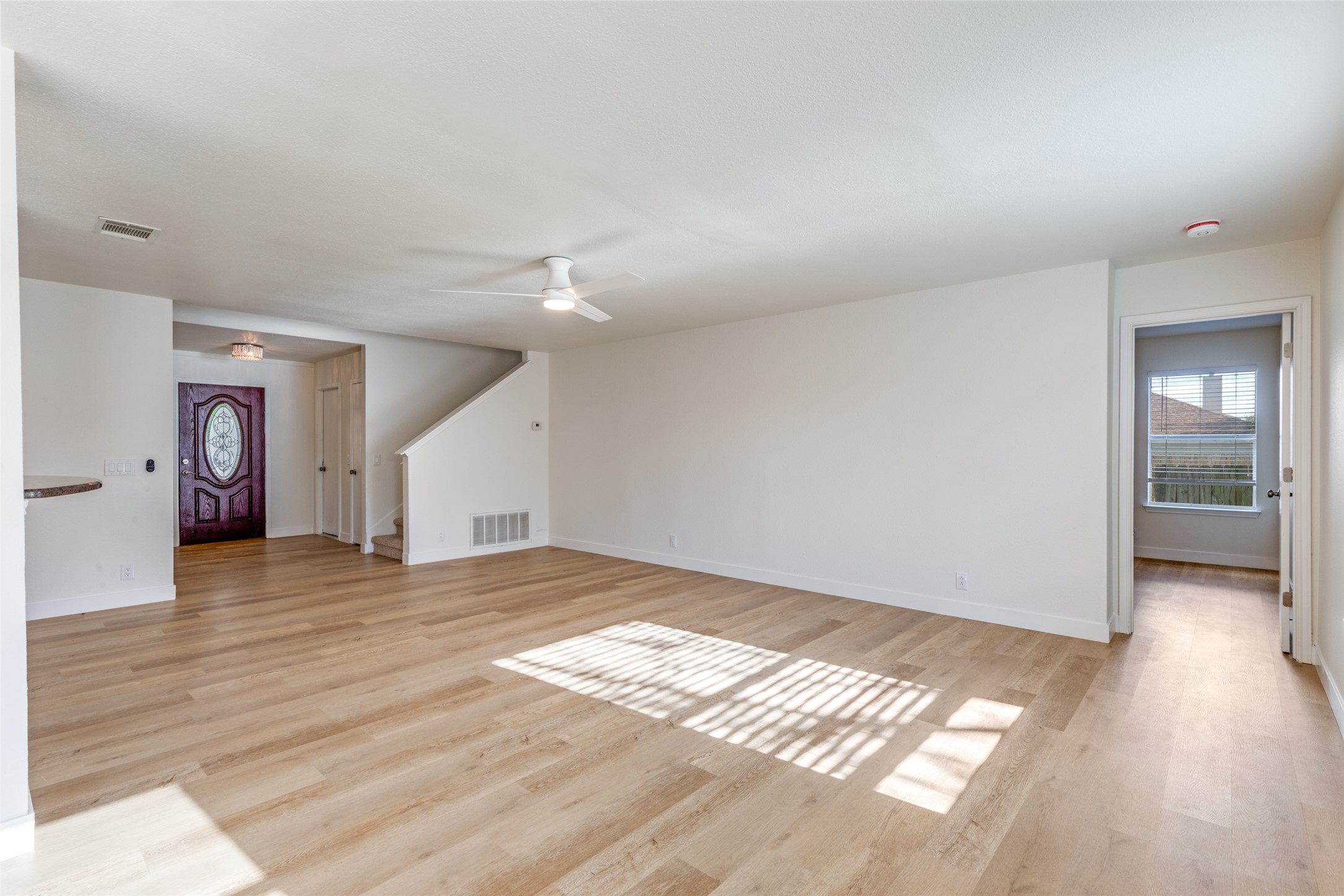 109 Orange Tree Lane Georgetown, TX 78626 - Photo 2 of 25 a view of empty room with wooden floor