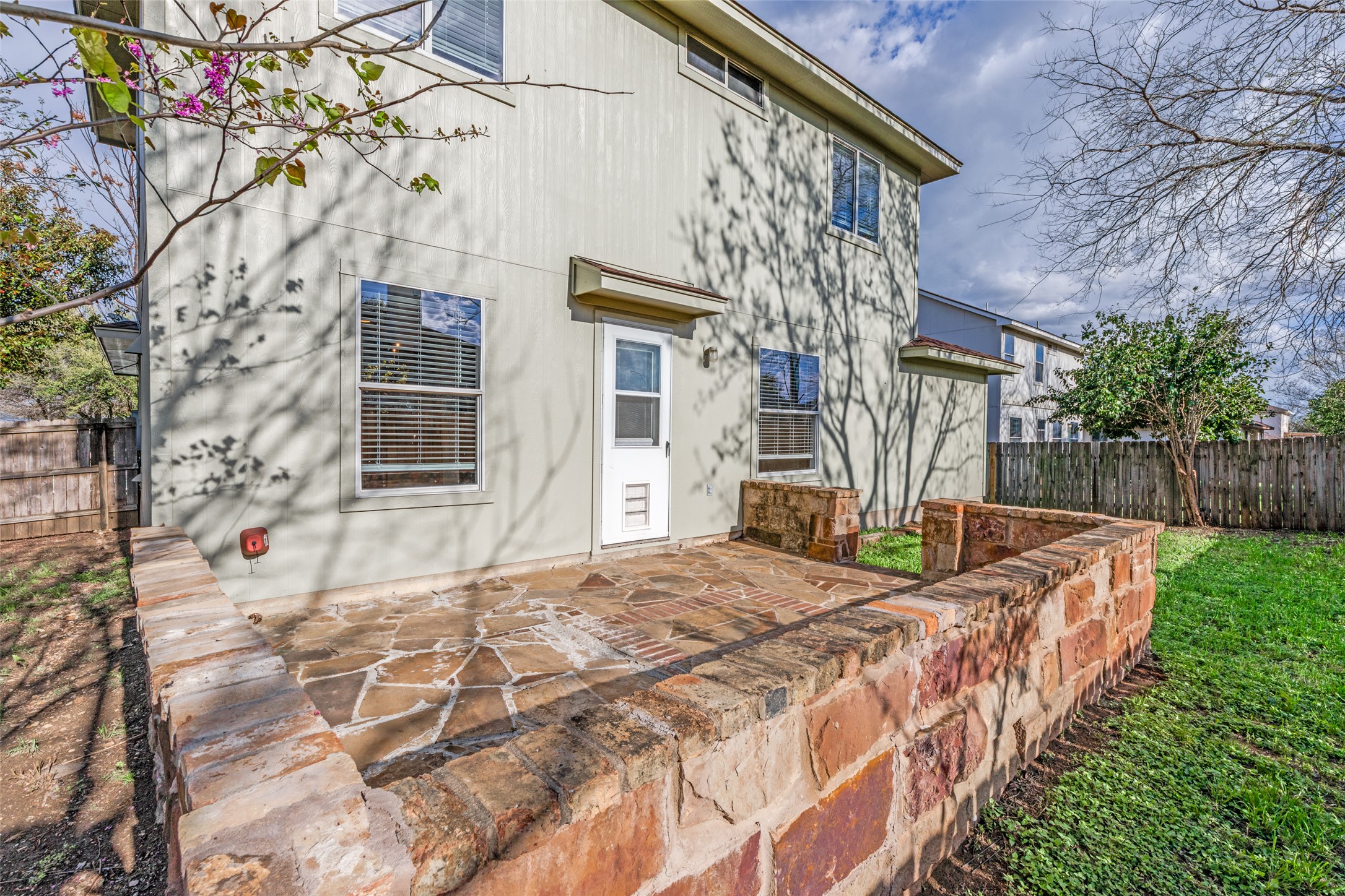 109 Orange Tree Lane Georgetown, TX 78626 - Photo 22 of 25 a front view of a house with garden