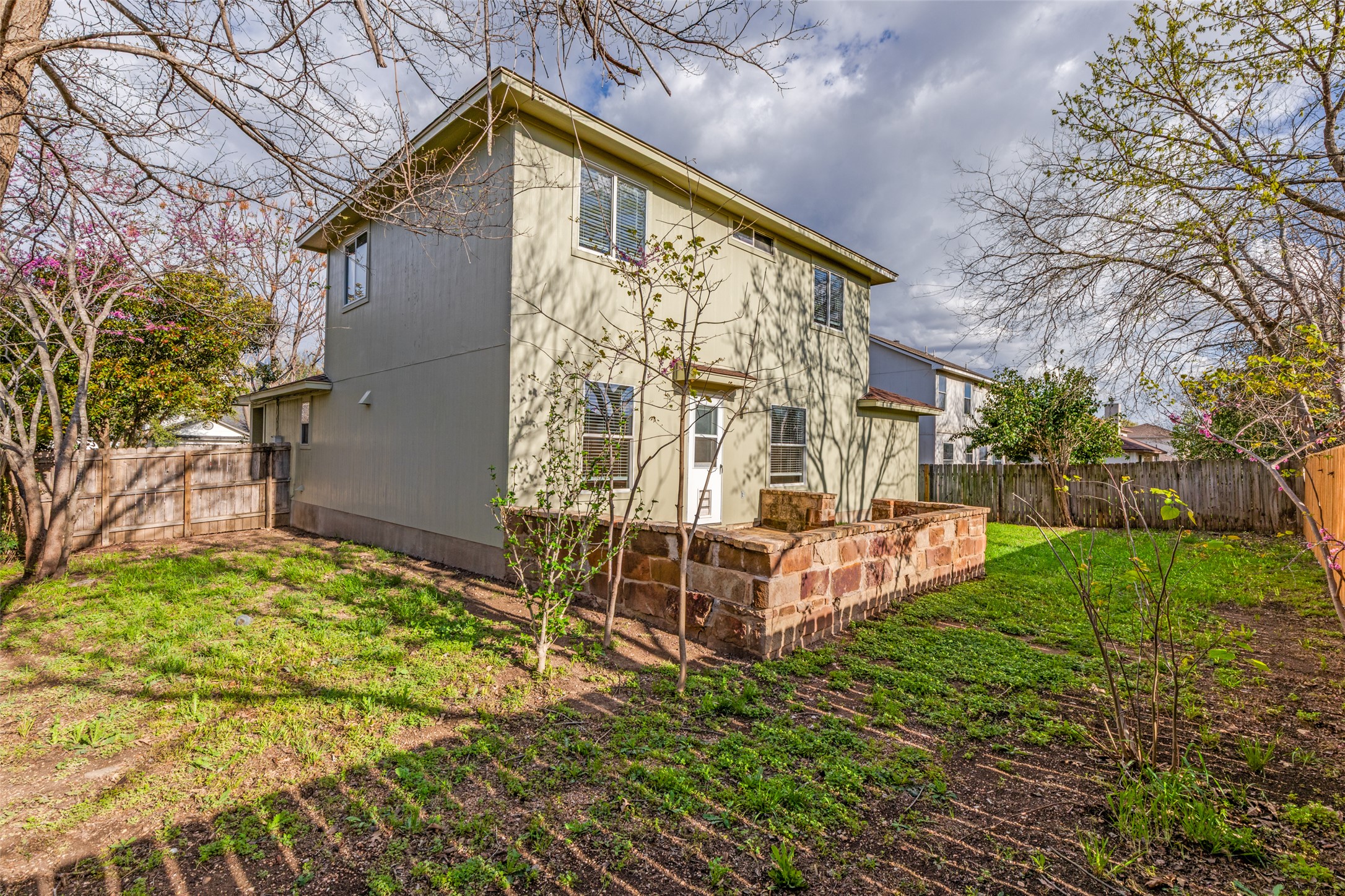 109 Orange Tree Lane Georgetown, TX 78626 - Photo 23 of 25 a view of a house with backyard and sitting area